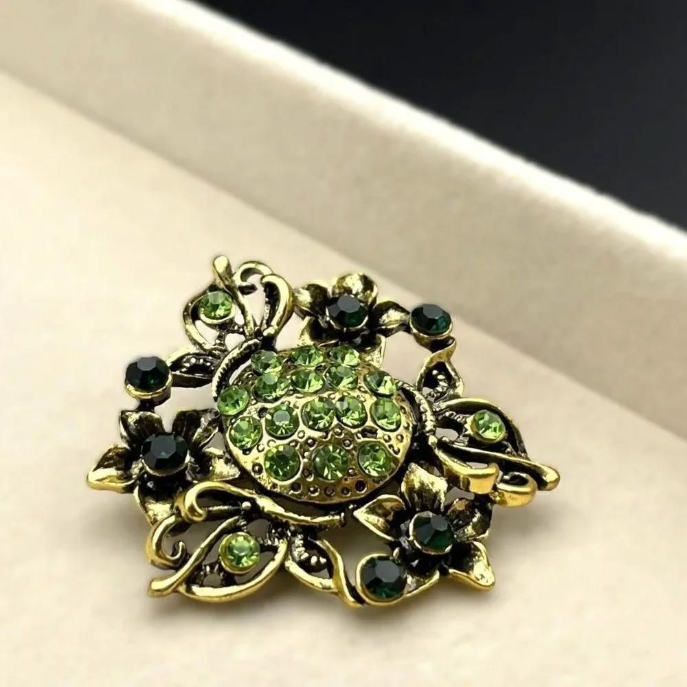 Yellow Gold with Emerald and Peridot Green Crystal Flower Pin Back Brooch